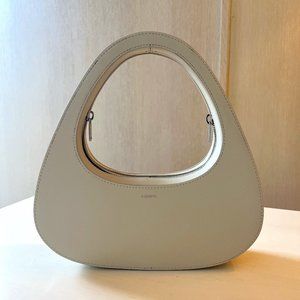 COPERNI Baguette Swipe Leather Bag